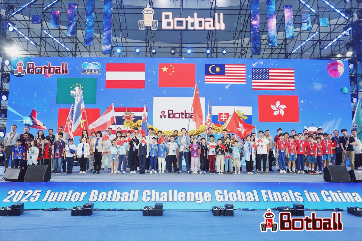 Teams on stage with flags at the 2025 Junior Botball Challenge Global Finals in China